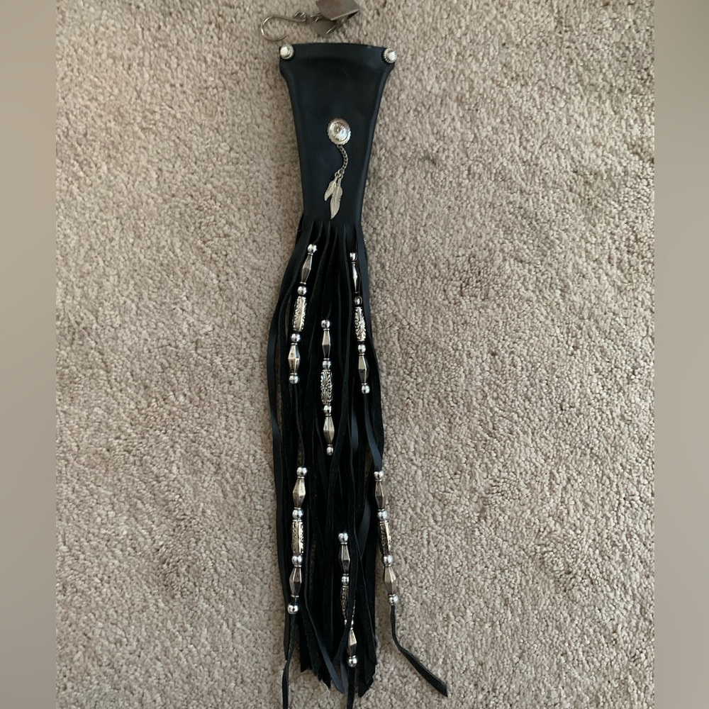 Leather hair wrap for riding